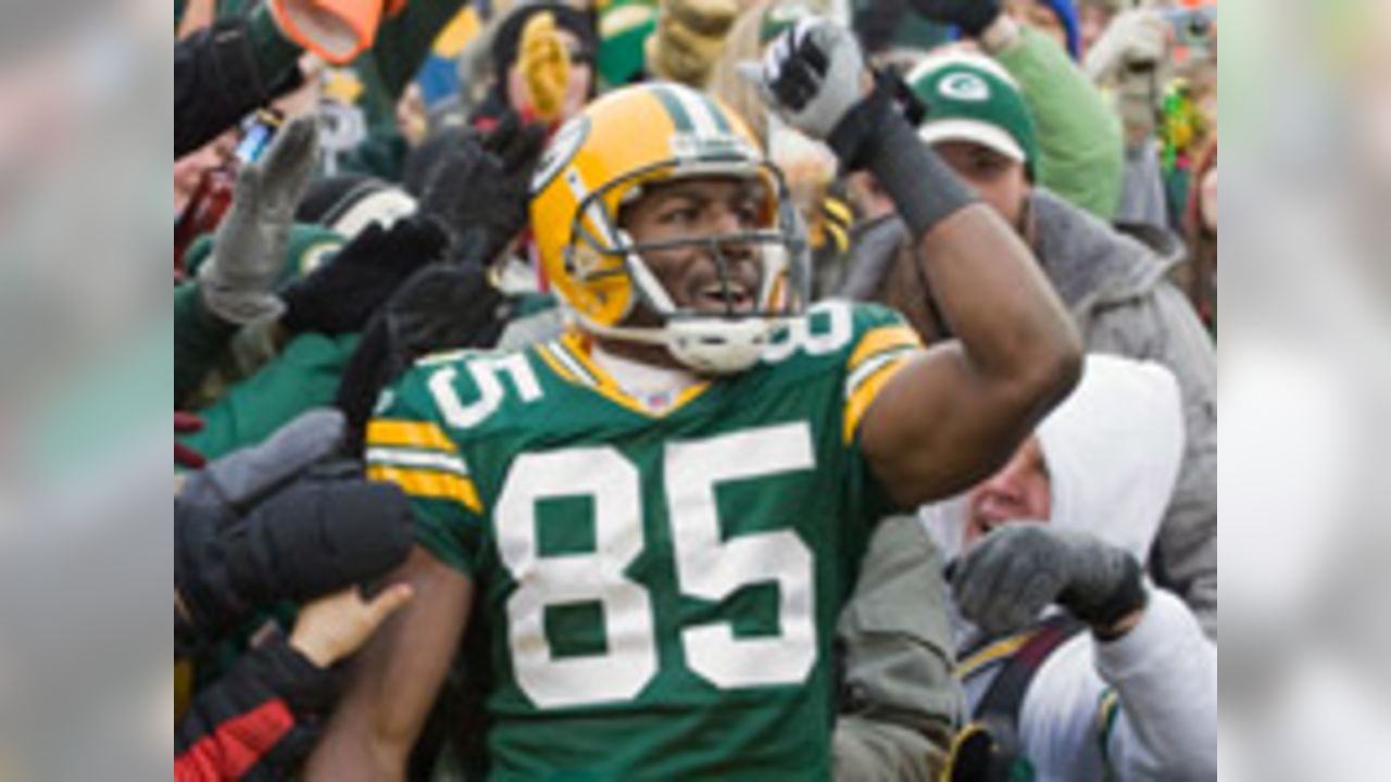 Green Bay Packers receiver Greg Jennings (85) breaks away for an 89-yard  reception during the first quarter of an NFL exhibition football game  against the Tennessee Titans on Friday, Sept. 1, 2006