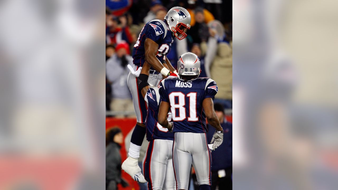 New England Patriots QB Tom Brady hands off to New England Patriots running  back Fred Taylor (21) in the second quarter against the Atlanta Falcons at  Gillette Stadium in Foxboro, Massachusetts on