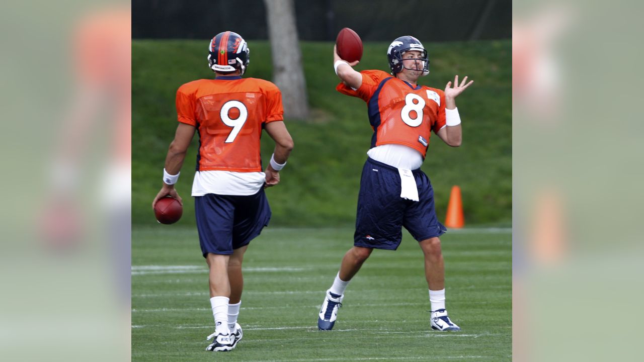 Denver Broncos rookie linebacker Devin Bishop heads to the field during NFL  football training camp in Englewood, Colo., Tuesday, Aug. 10, 2010. Rookies  received a haircut from veterans Saturday. (AP Photo/Jack Dempsey