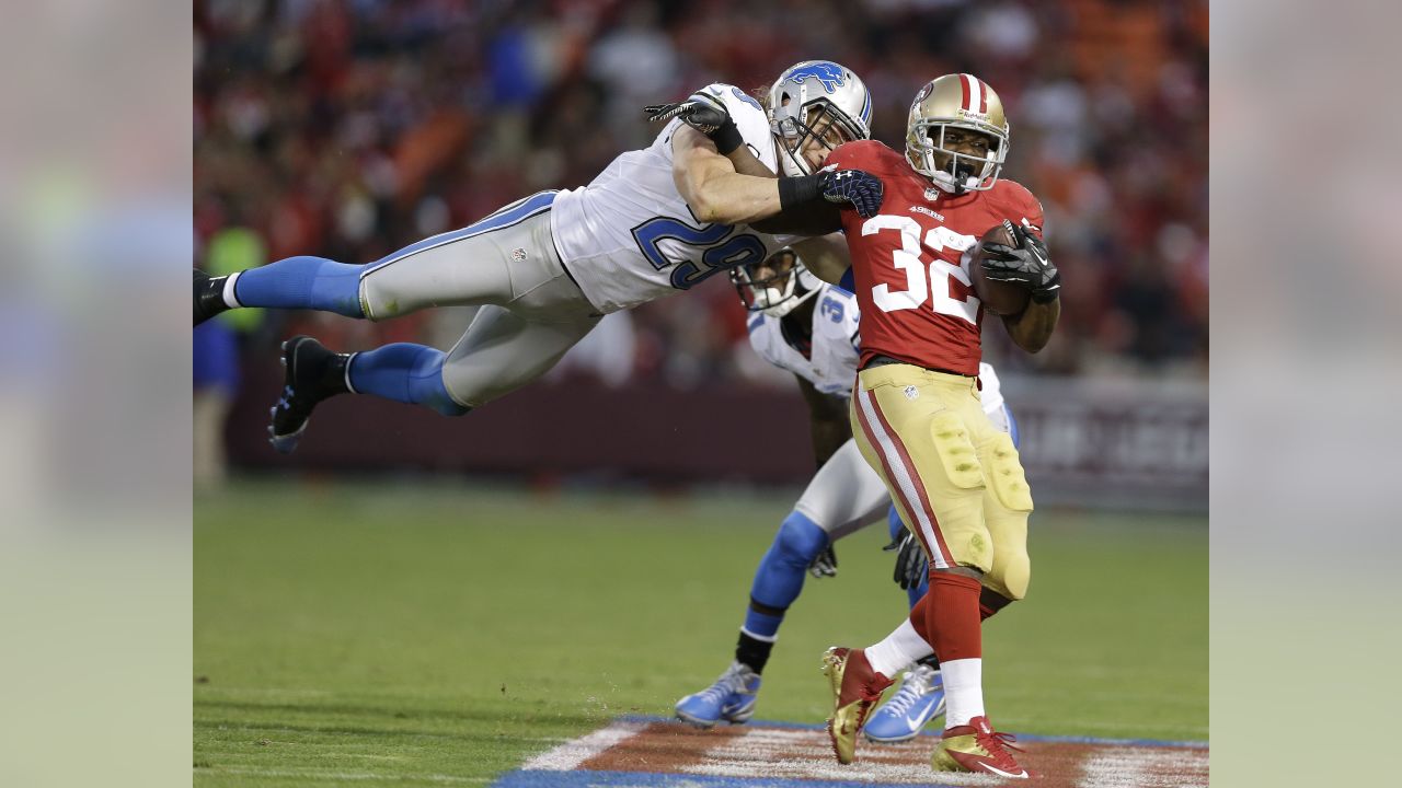 San Francisco 49ERS Alex Smith hands off to Frank Gore in the second  quarter in week 4 of the NFL season at MetLife Stadium in East Rutherford,  New Jersey on September 30