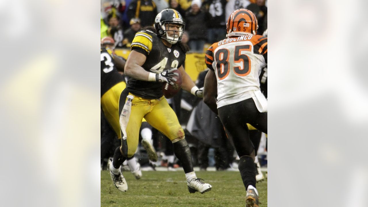 Cincinnati Bengals - Cincinnati Bengals linebacker Keith Rivers (55) looks  to tackle Pittsburgh Steelers running back Rashard Mendenhall (34) during  the first quarter of an NFL football game, Sunday, Dec. 12, 2010