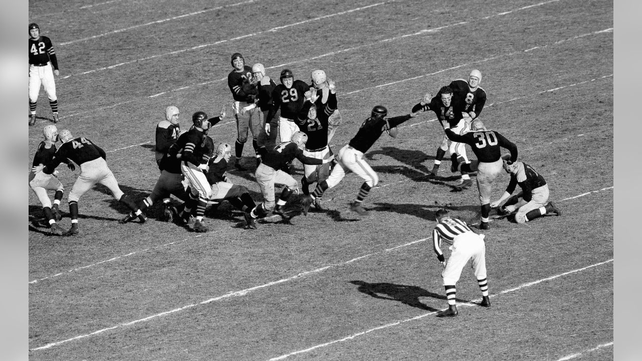 Only two feet short of a touchdown, Green Bay Packers Clarke Hinkle is  shown as he was halted by the New York Giants in the second period of their  championship game with