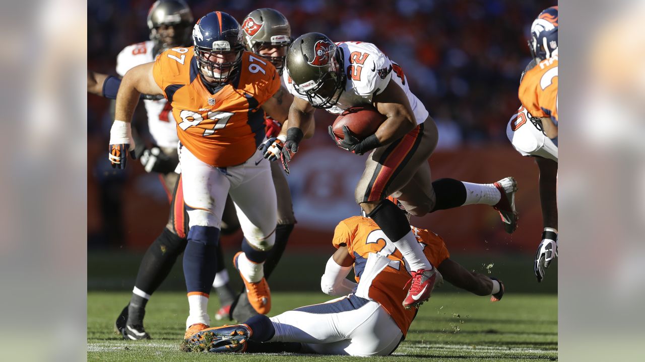 Denver Broncos guard Zane Beadles (68) congratulates wide receiver Demaryius  Thomas (88) after Thomas caught a pass for a touchdown in the third quarter  of an NFL football game, Sunday, Dec. 2