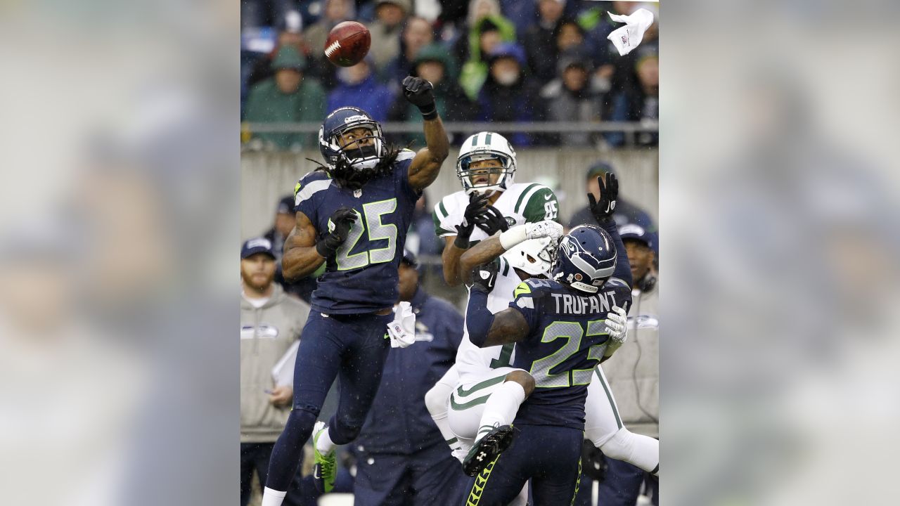 Seattle Seahawks' Sidney Rice (18) celebrates his touchdown against the  Minnesota Vikings with teammates Max Unger (60) and John Moffitt (74)  during the first half of an NFL football game, Sunday, Nov.