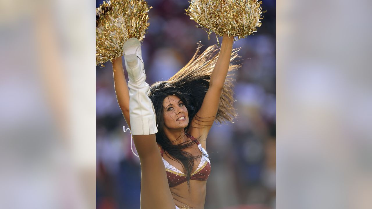 A general view of a St. Louis Rams cheerleader shaking her pom-poms