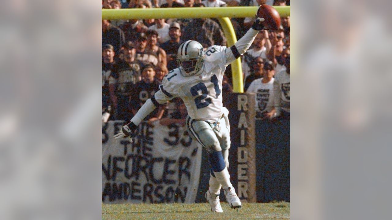 Dallas Cowboys defender Deion Sanders (21) knocks the ball away from San  Francisco 49ers receiver Jerry Rice (80) in the second quarter in Irving,  Texas, Sunday, Nov. 12, 1995. (AP Photo/Eric Gay