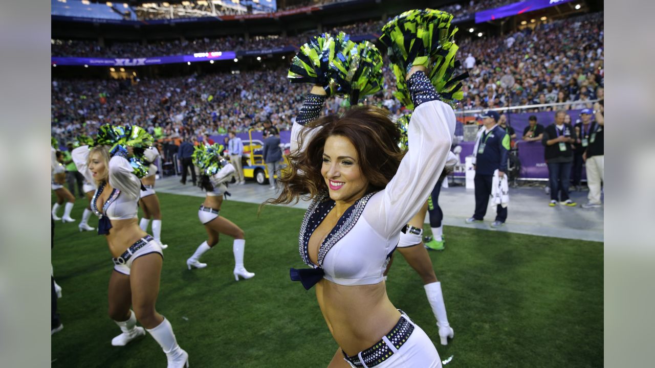 The Sea Gals cheerleades wear combat boots in honor of veterns before the  Seattle Seahawks against the New York Giants NFL football game, Sunday,  Nov. 7, 2010, in Seattle. (AP Photo/Ted S.