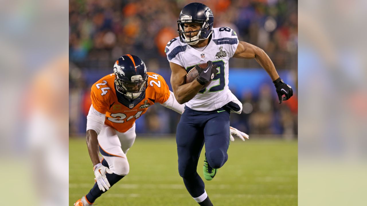 Seattle Seahawks outside linebacker Malcolm Smith (53) and cornerback Byron  Maxwell (41) celebrate a touchdown during the first half against the Denver  Broncos in Super Bowl XLVIII at MetLife Stad …