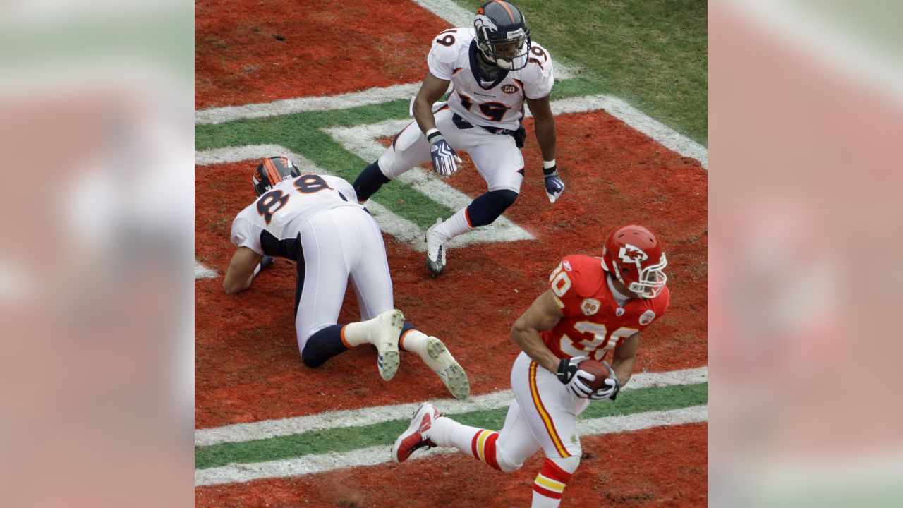 Kansas City Chiefs Head Coach Todd Haley talks to RB Jamaal