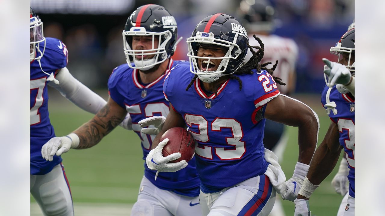 New York Giants running back Gary Brightwell (23) runs up the field during  an NFL football game against the Green Bay Packers at Tottenham Hotspur  Stadium in London, Sunday, Oct. 9, 2022.