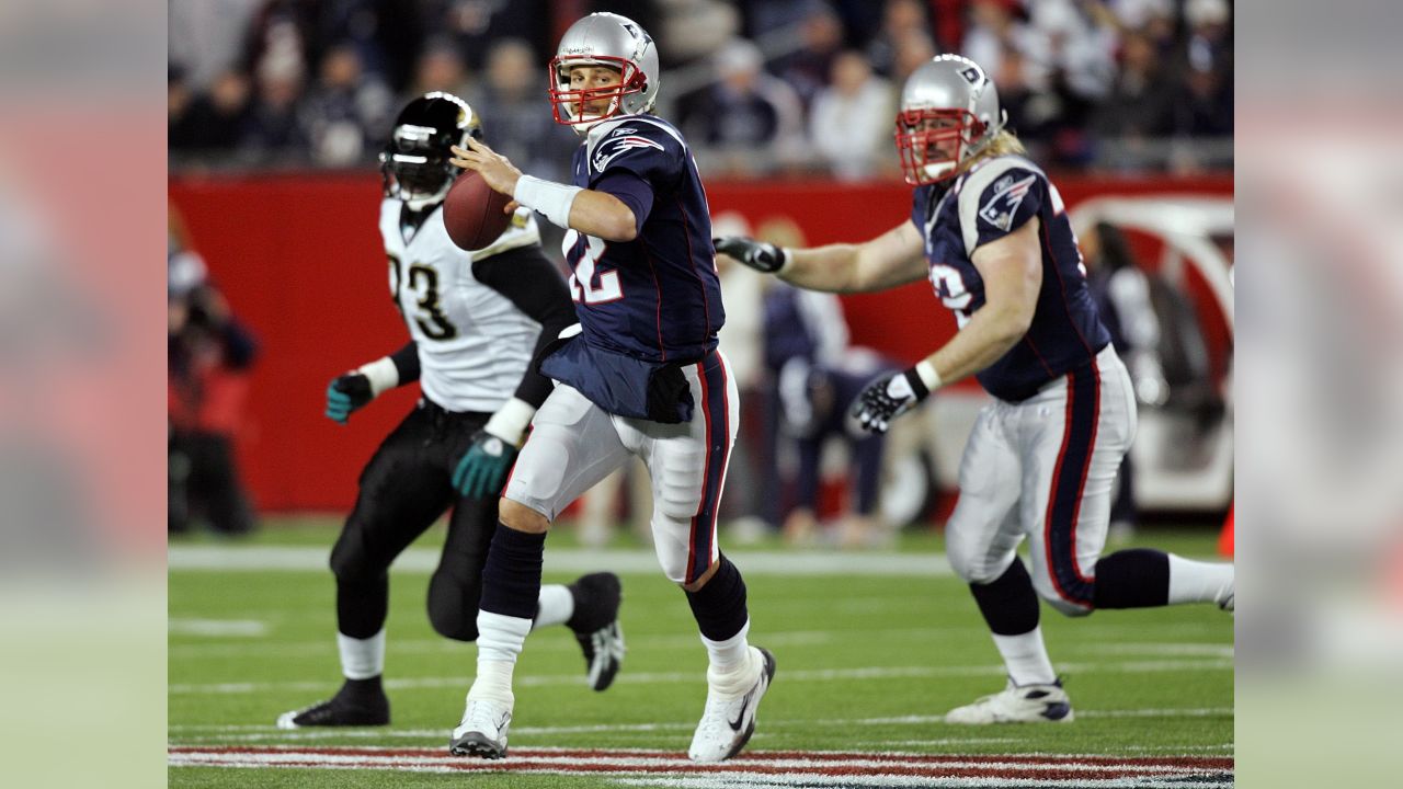 New England Patriots QB Tom Brady hands off to New England Patriots running  back Fred Taylor (21) in the second quarter against the Atlanta Falcons at  Gillette Stadium in Foxboro, Massachusetts on