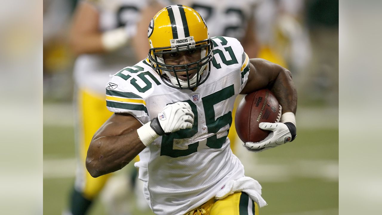 Green Bay Packers quarterback Brett Favre lifts Donald Driver after  throwing a touchdown pass to Greg Jennings during the second half of an NFL  football game against the San Diego Chargers Sunday