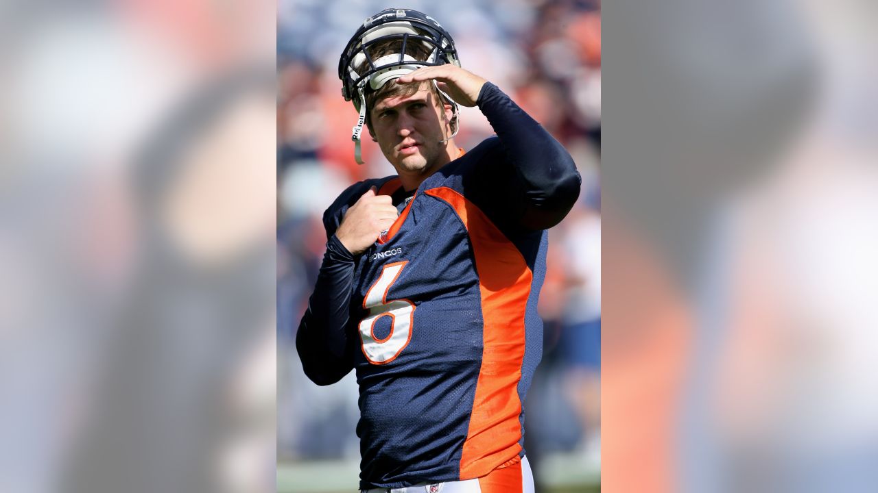 Denver Broncos quarterback Jay Cutler warms up at Invesco Field at