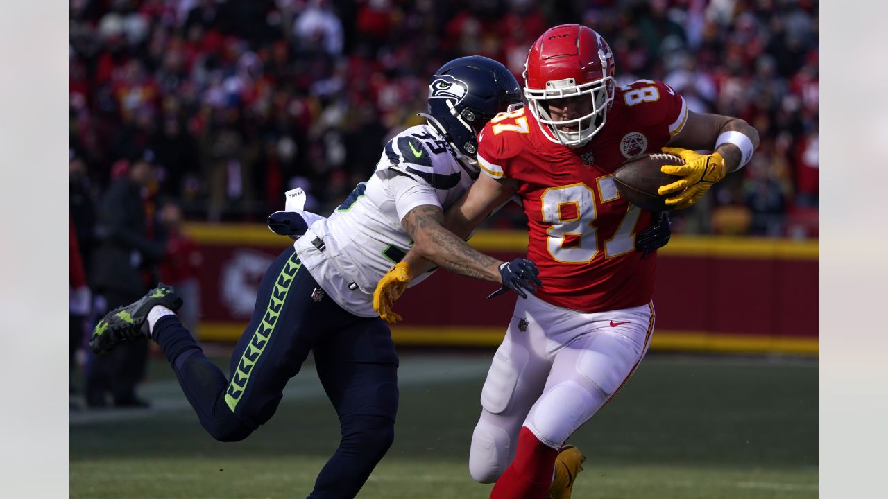 Kansas City Chiefs safety Juan Thornhill (22) makes an interception  intended for Cincinnati Bengals wide receiver Ja'Marr Chase (1) during an  NFL football game, Sunday, Dec. 4, 2022, in Cincinnati. The play