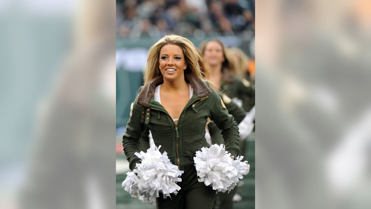 A New York Jets cheerleader perform during the first half of an NFL  football game against the San Diego Chargers, Sunday, Dec. 23, 2012 in East  Rutherford, N.J. (AP Photo/Kathy Willens Stock