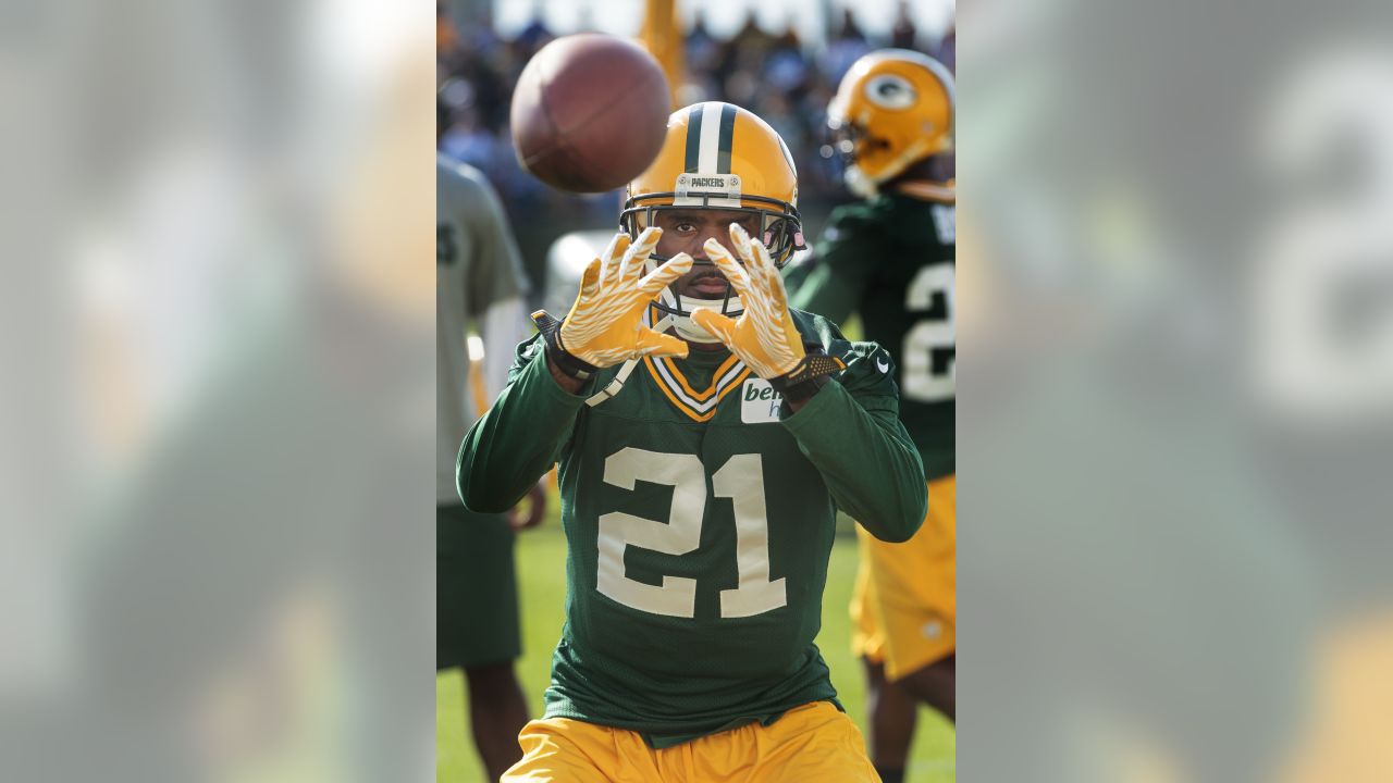 Green Bay Packers cornerback Charles Woodson (21) celebrates his