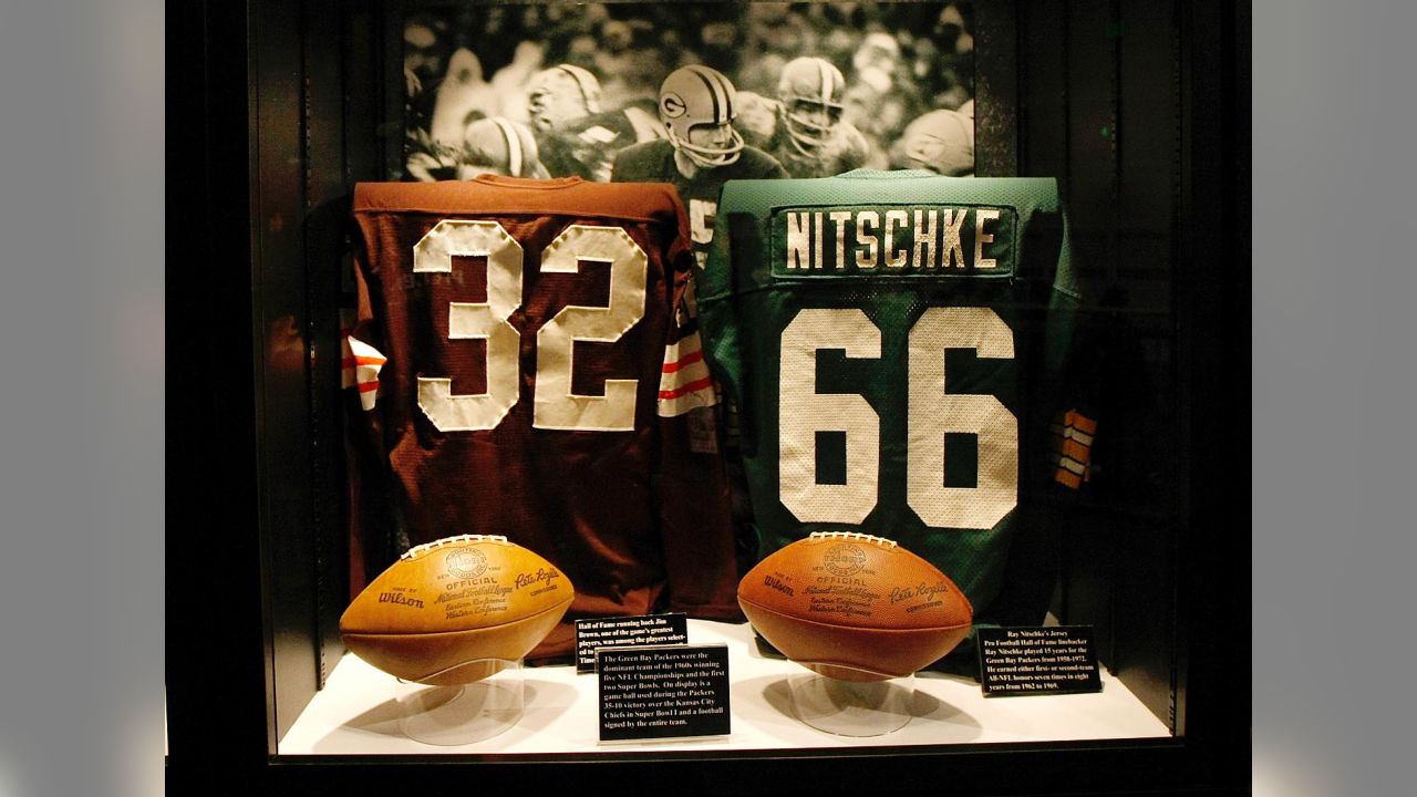 Green Bay Packers linebacker Ray Nitschke (66) lowers his head, as