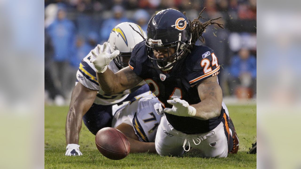 Chicago Bears running back Marion Barber (24) celebrates his touchdown  against the Minnesota Vikings with Bears wide receiver Roy Williams (11)  during the first quarter of their game at Soldier Field in