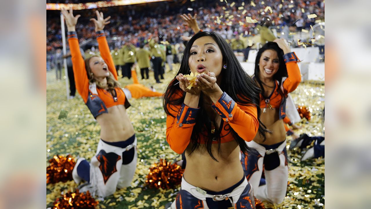 The Denver Broncos cheerleaders perform during the first half of