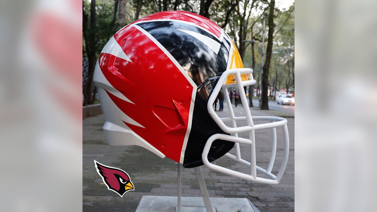 Artists take on all 32 NFL team helmets