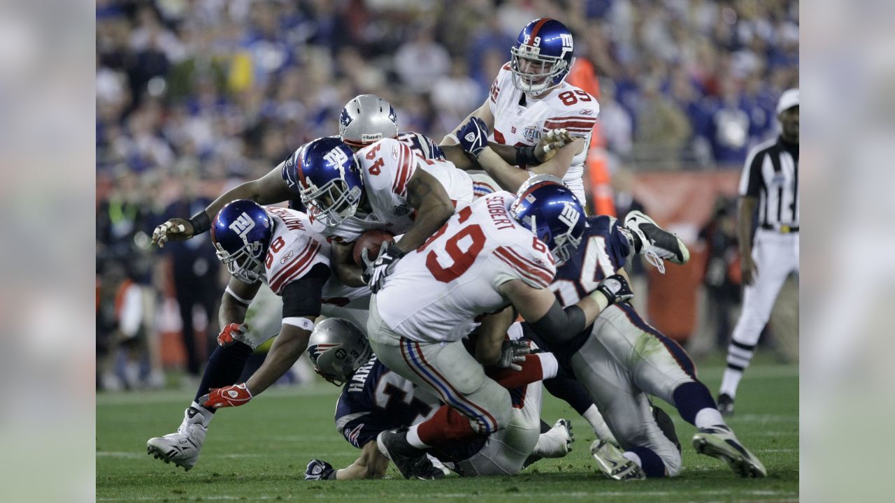 The New York Giants' Tom Strahan, left, and Eli Manning celebrate after a  17-14 Giants' victory in Super Bowl XLII at University of Phoenix Stadium  in Glendale, AZ, USA on February 3