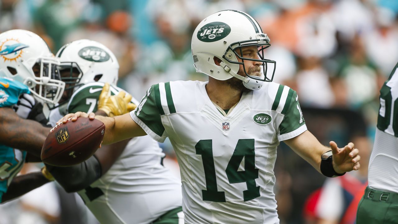 East Rutherford, New Jersey, USA. 8th Dec, 2019. Miami Dolphins quarterback  Ryan Fitzpatrick (14) looks to pass during a NFL game between the Miami  Dolphins and the New York Jets at MetLife