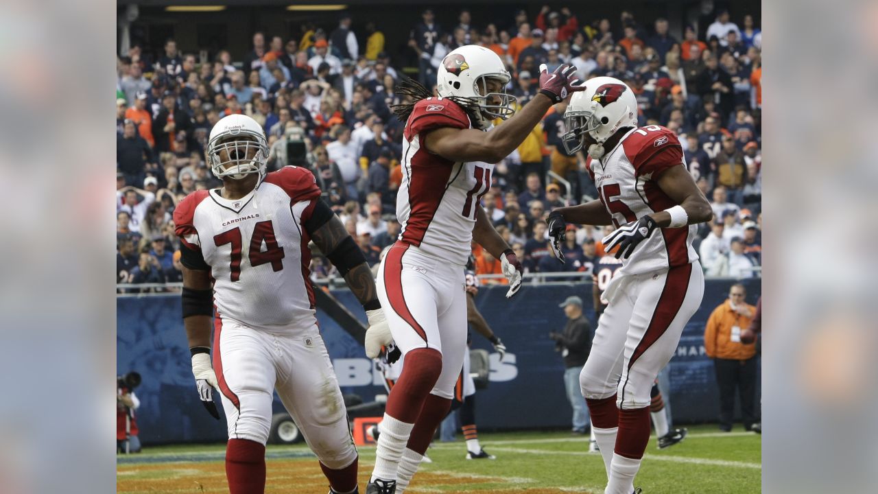 Arizona Cardinals line backer Karlos Dansby (58) celebrates an interception  with team mates Ralph Brown (20) and Gabe Watson (98) in the second quarter  against the Pittsburgh Steelers at Super Bowl XLIII