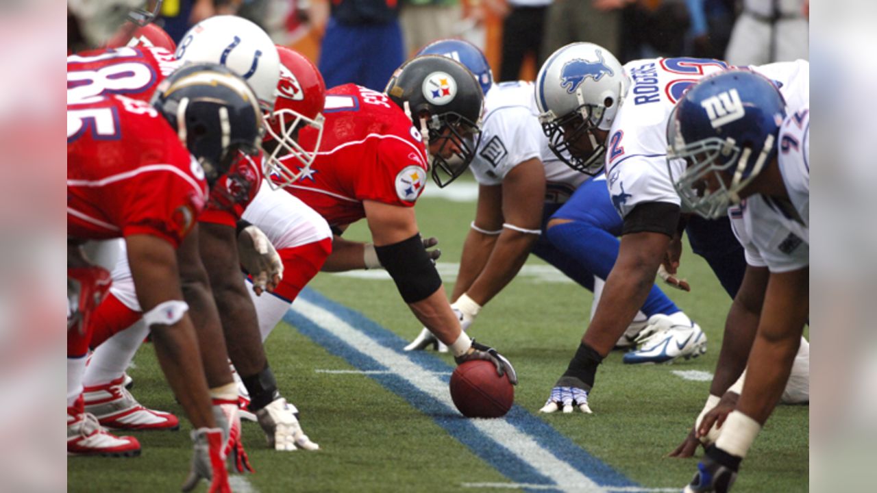 NFC Tampa Bay Buccaneers Derrick Brooks (55) comes down on AFC Baltimore  Ravens tackle Jonathan Ogden (75) during a play in the third quarter of the  NFL football Pro Bowl at Aloha