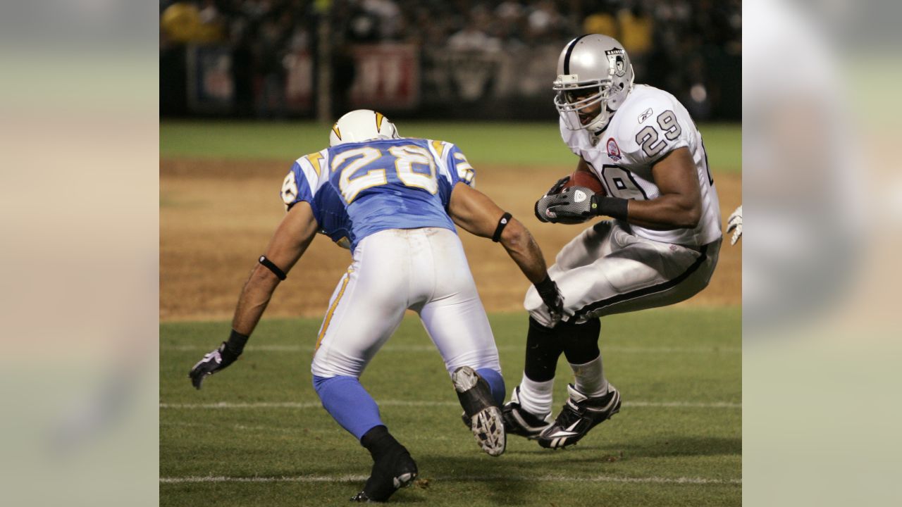 Oakland Raiders wide receiver Louis Murphy hauls in a 57-yard touchdown grab  against the San Diego Chargers during the fourth quarter of an NFL football  game in Oakland, Calif., Monday, Sept. 14