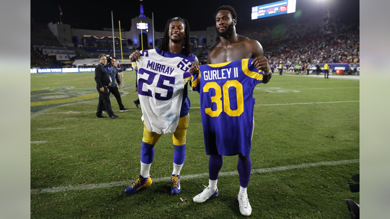 Rapper YG wears the jersey of Los Angeles Rams wide receiver