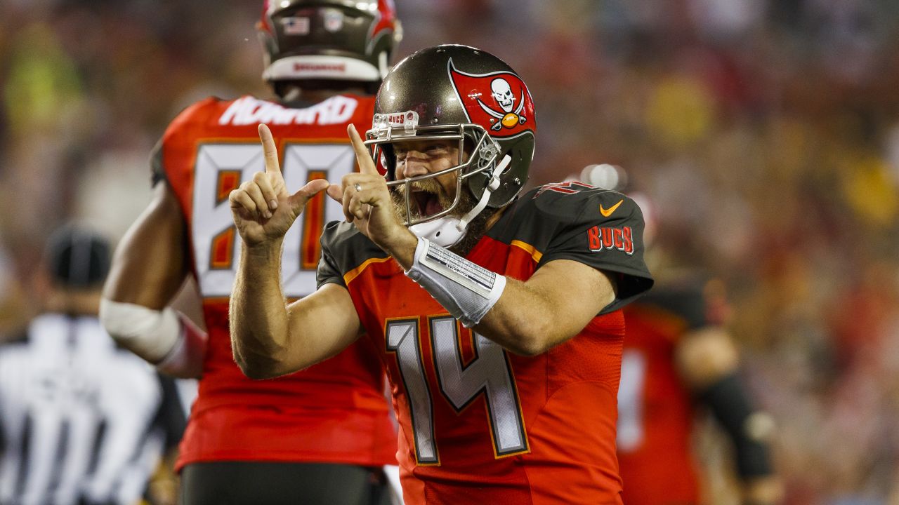 Quarterback Ryan Fitzpatrick celebrates a touchdown during the