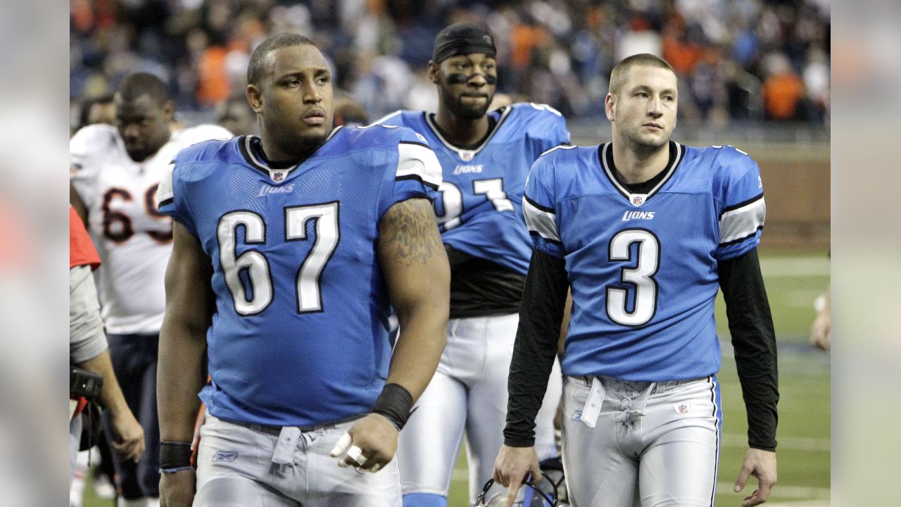 A Detroit Lions fan wears a bag during the fourth quarter of an NFL  football game against the Chicago Bears at Ford Field in Detroit, Sunday,  Dec. 5, 2010. (AP Photo/Carlos Osorio