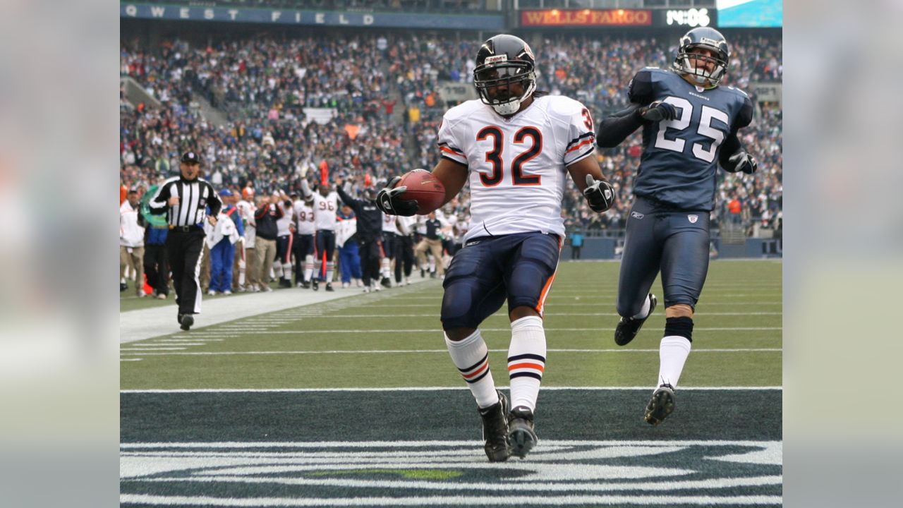 Chicago Bears wide receiver Muhsin Muhammad, (87) celebrates his first  quarter touchdown with Bernard Berrian, (80) and Cedric Benson, (32) during  their NFL football game at Soldier Field in Chicago, Ill., Sunday