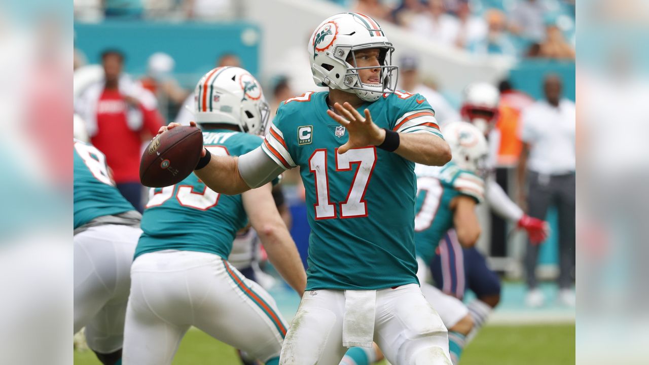 Miami Dolphins defensive tackle Davon Godchaux (56) reacts after sacking New  England Patriots quarterback Tom Brady, during the first half of an NFL  football game, Sunday, Dec. 9, 2018, in Miami Gardens