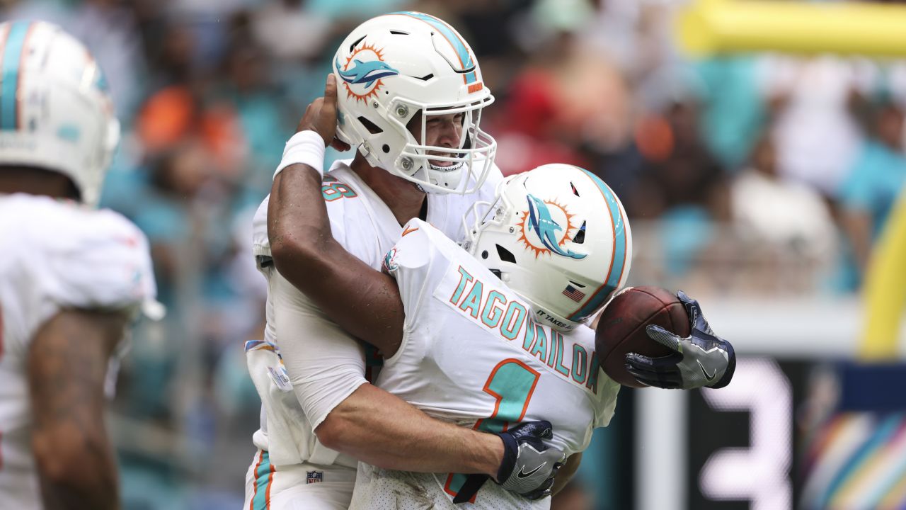 Miami Dolphins tight end Mike Gesicki (88) runs onto the field as he is  introduced to the fans before an NFL football game between the Houston  Texans and the Miami Dolphins, Sunday