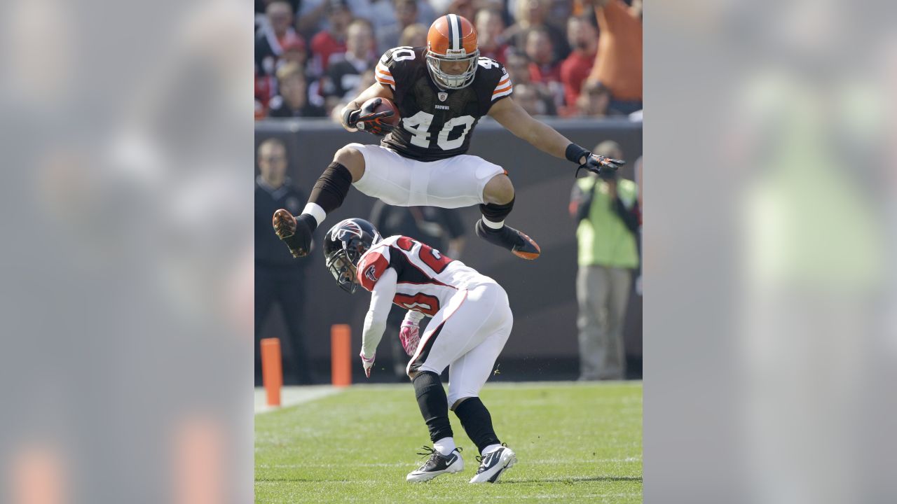 New England Patriots fullback Jakob Johnson, right, dives for the ball  against Tampa Bay Buccan …