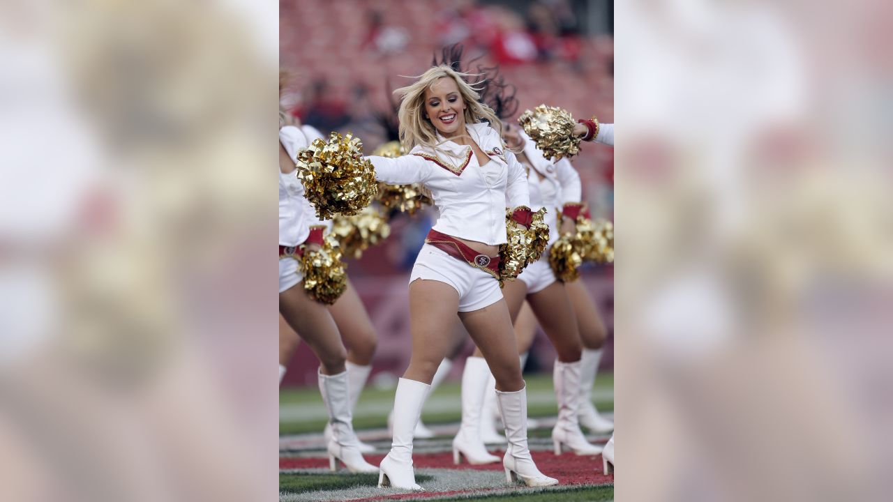 Carolina Panthers' Top Cats dance in their Santa outfits during the first  half of an NFL football game against the Arizona Cardinals in Charlotte,  N.C., Sunday, Dec.19, 2010. (AP Photo/Rick Havner Stock