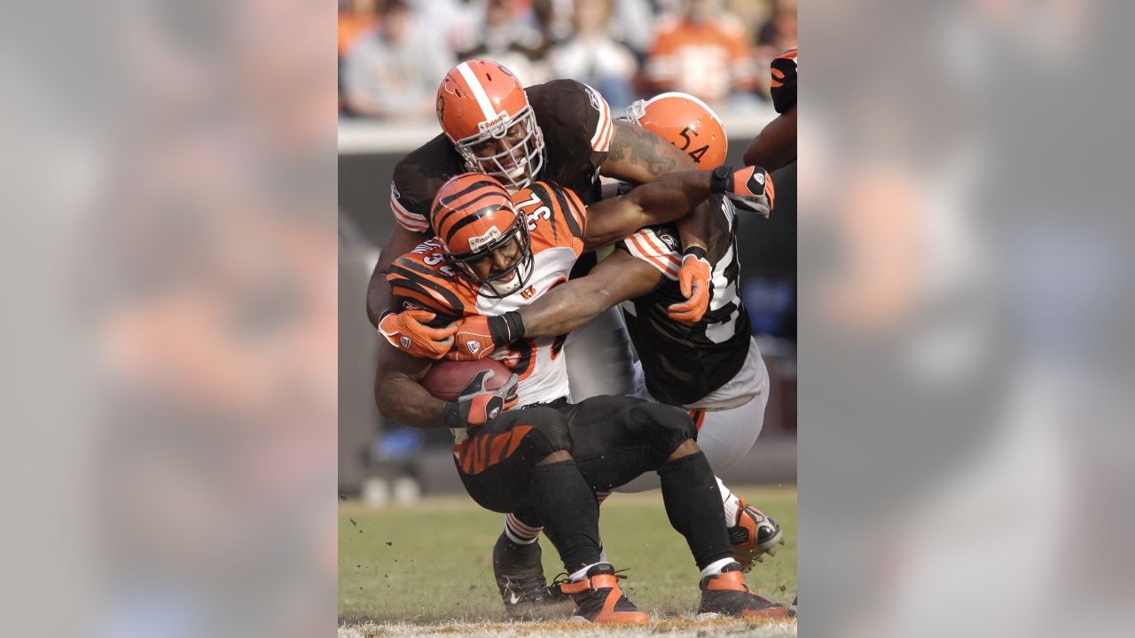 Cincinnati Bengals running back Rudi Johnson points to a group of