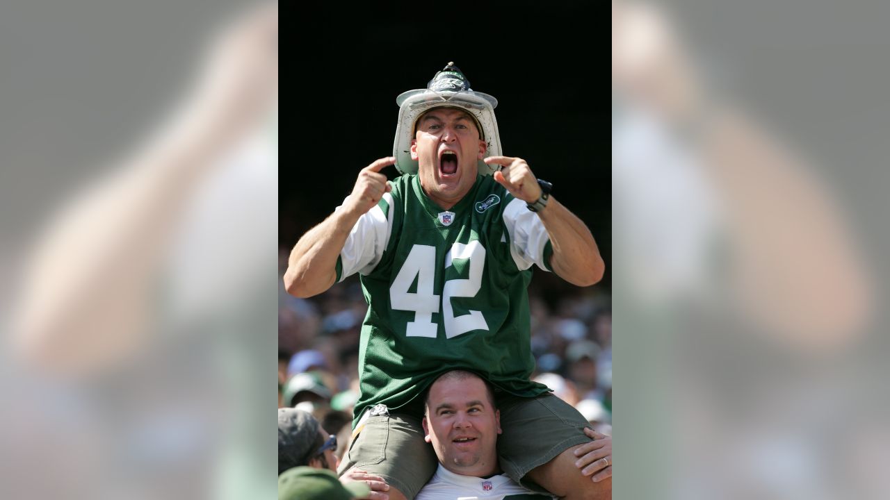 JET MAN, formerly known as Fireman Ed, leads Jets Cheers