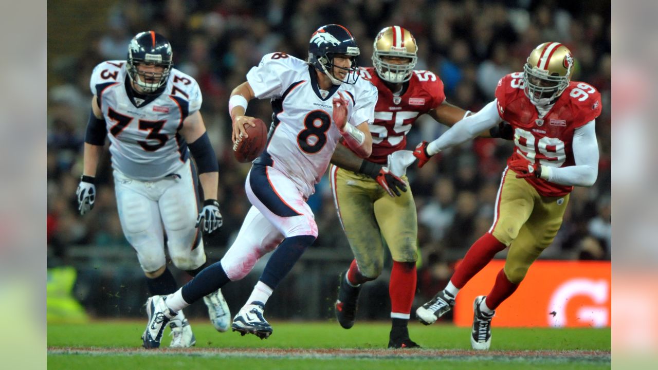 Denver Broncos Wide receiver Brandon Lloyd runs with the football during  their match with the San Francisco 49ers in the International NFL series  match at Wembley Stadium in London on October 31