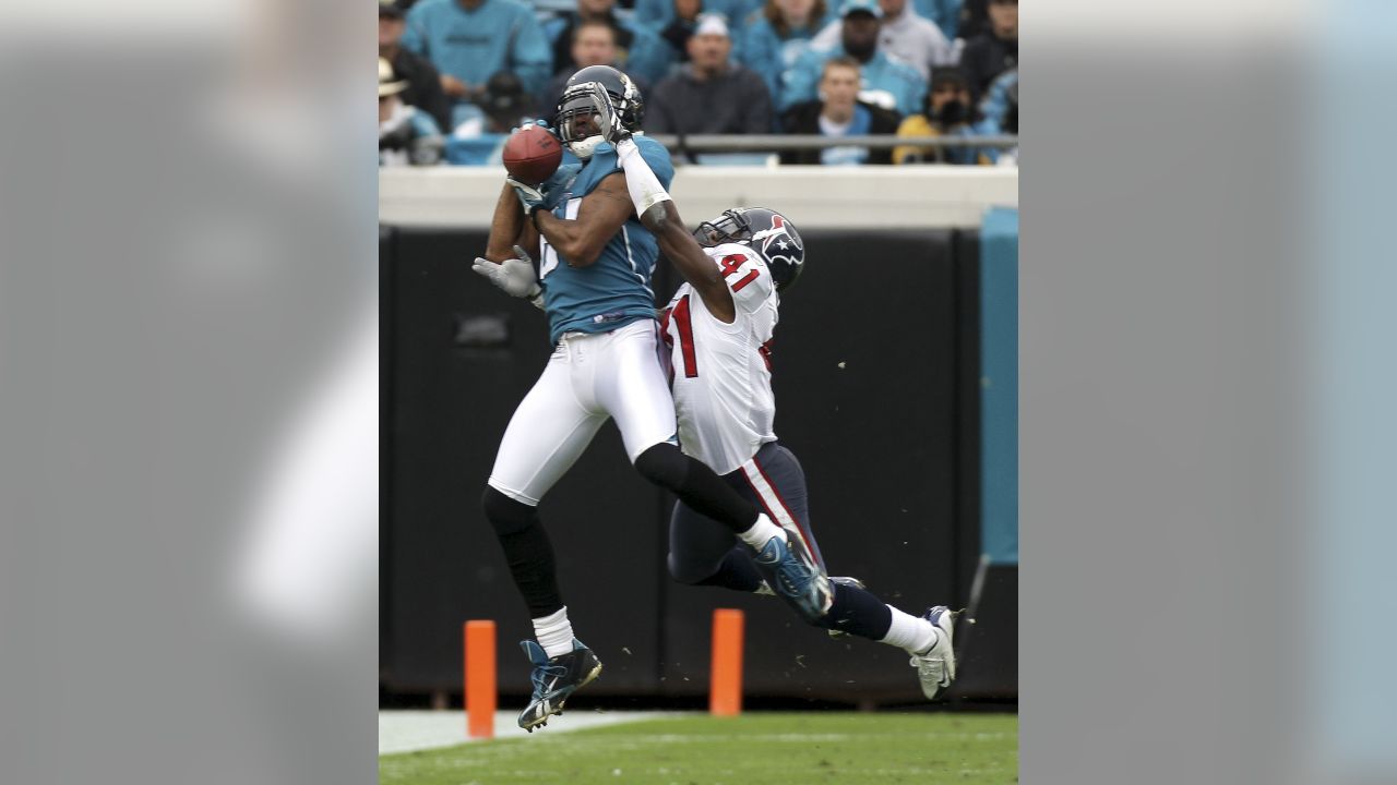 Houston Texans wide receiver Andre Johnson wears Play 60 eyeblack  stickers before an NFL football game against the Jacksonville Jaguars  Thursday, Dec. 5, 2013, in Jacksonville, Fla. (AP Photo/Stephen Morton  Stock Photo 