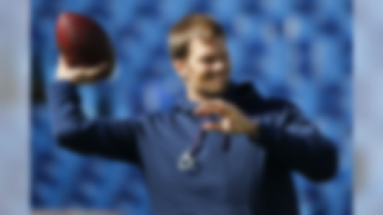 New England Patriots quarterback Tom Brady warms up before an NFL football game against the Buffalo Bills, Sunday, Oct. 12, 2014, in Orchard Park, N.Y. (AP Photo/Mike Groll)