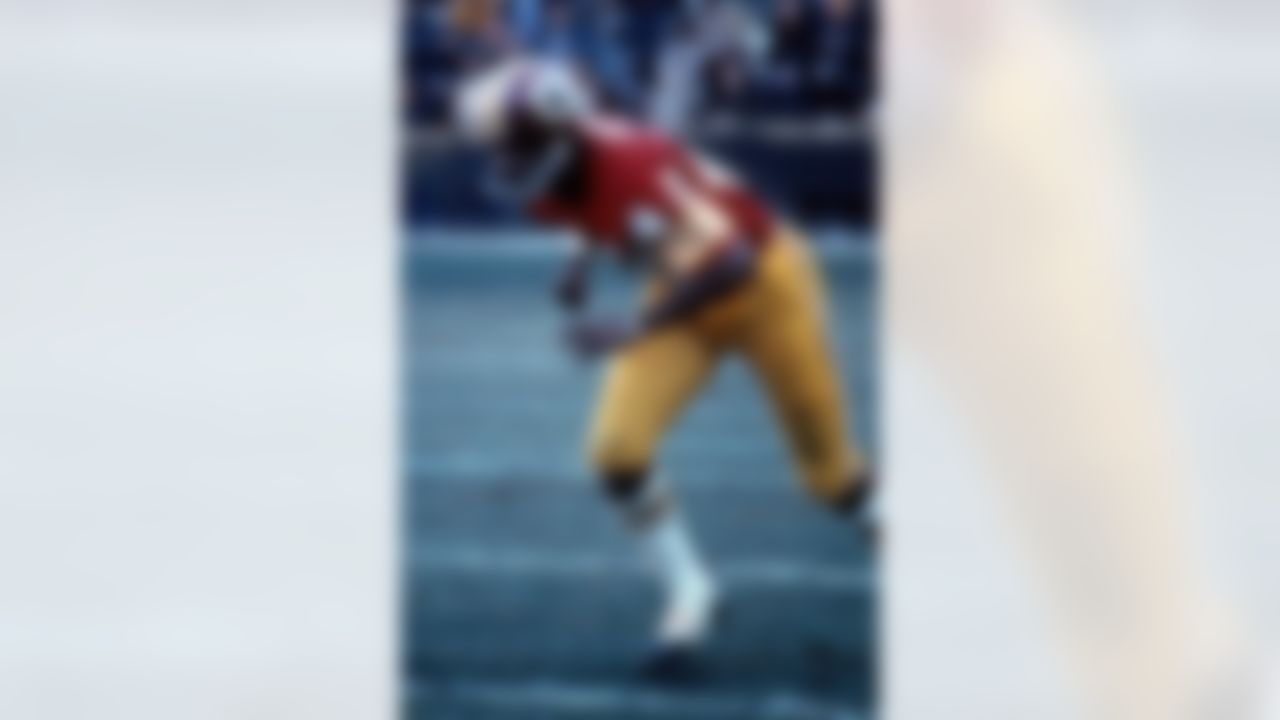 Hall of Fame wide receiver Charley Taylor (42) of the Washington Redskins runs upfield in an undated image. (National Football League)