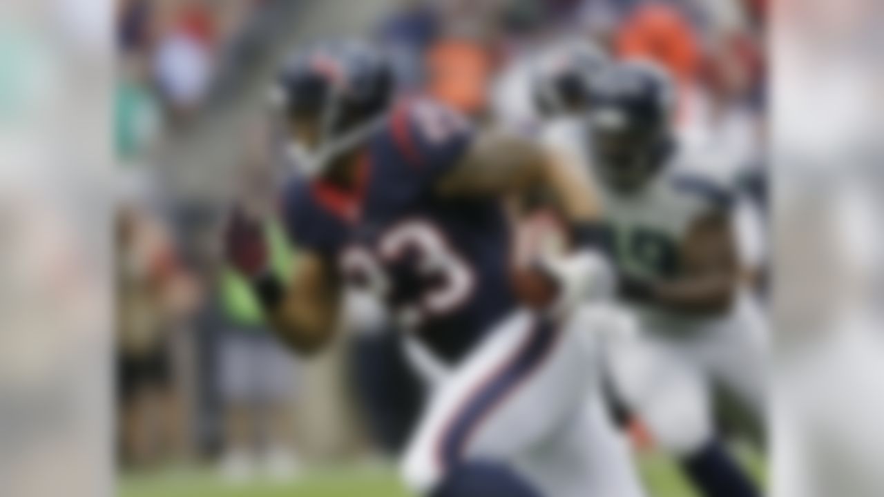 Houston Texans' Arian Foster (23) runs against the Seattle Seahawks during the first quarter an NFL football game Sunday, Sept. 29, 2013, in Houston. (AP Photo/David J. Phillip)