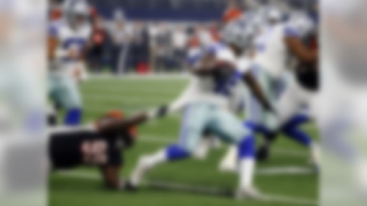 Cincinnati Bengals defensive tackle Andrew Billings (99) pulls down Dallas Cowboys running back Rod Smith (45) during the first half of a preseason NFL Football game in Arlington, Texas, Saturday, Aug. 18, 2018. (AP Photo/Michael Ainsworth)