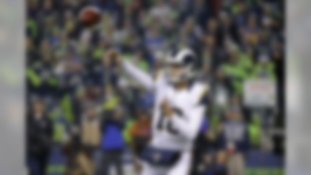 Los Angeles Rams quarterback Jared Goff passes against the Seattle Seahawks in the first half of an NFL football game, Thursday, Dec. 15, 2016, in Seattle. (AP Photo/Elaine Thompson)