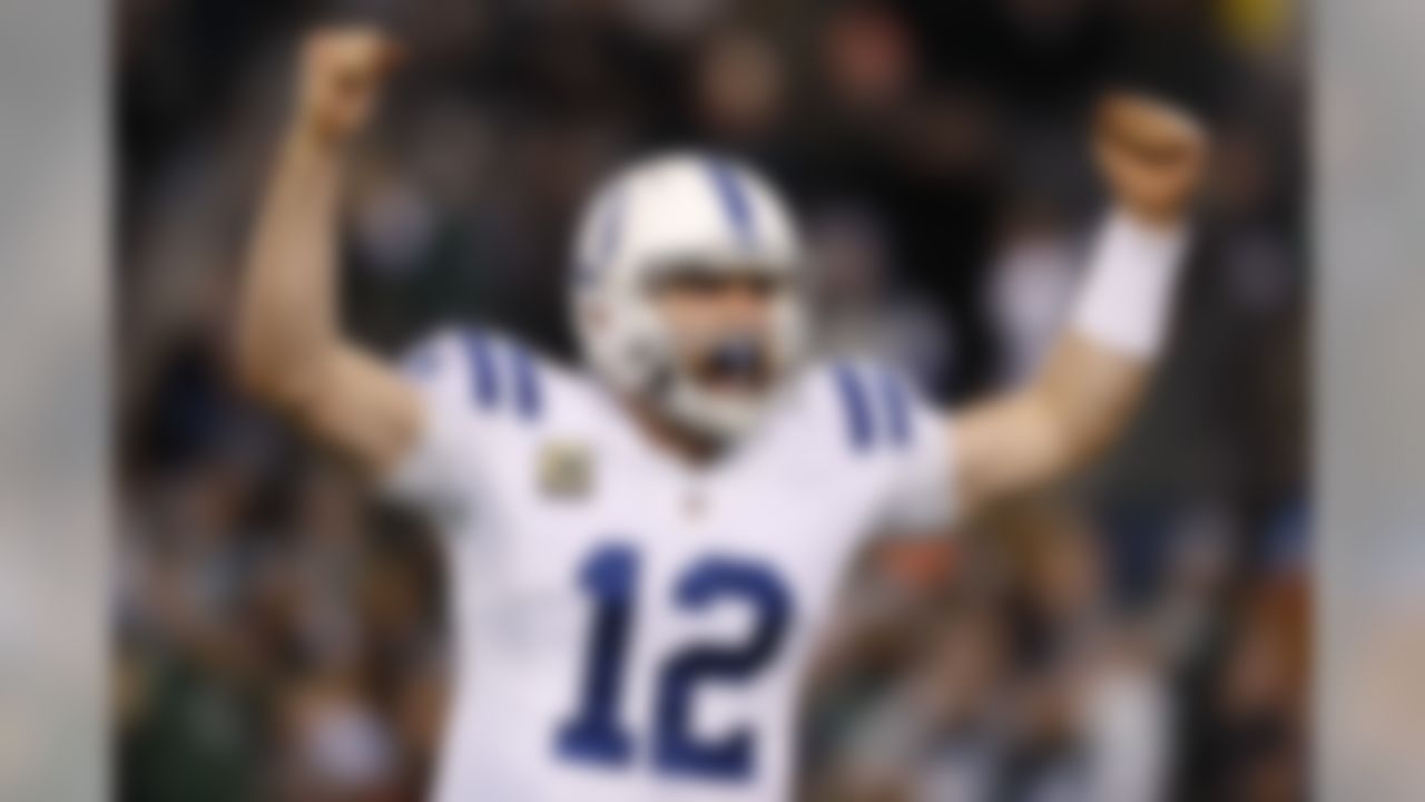 Indianapolis Colts quarterback Andrew Luck (12) celebrates a touchdown pass during an NFL regular season game against the New York Jets at MetLife Stadium in East Rutherford, NJ. (Ric Tapia/NFL)