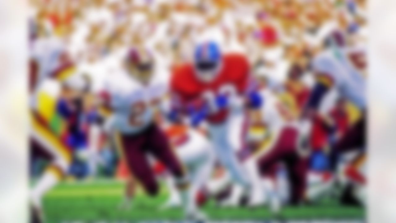 Denver Broncos running back Gene Lang (33) carries the ball during Super Bowl XXII, a 42-10 loss to the Washington Redskins on January 31, 1988, at Jack Murphy Stadium in San Diego, CA. (National Football League)