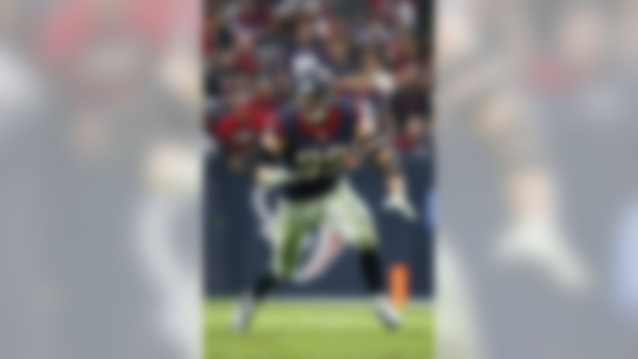 Houston Texans defensive end J.J. Watt (99) rushes the passer during an NFL football game against the Baltimore Ravens at NRG Stadium on Sunday December 21, 2014 in Houston, Texas. Houston won 25-13. (Aaron M. Sprecher/NFL)