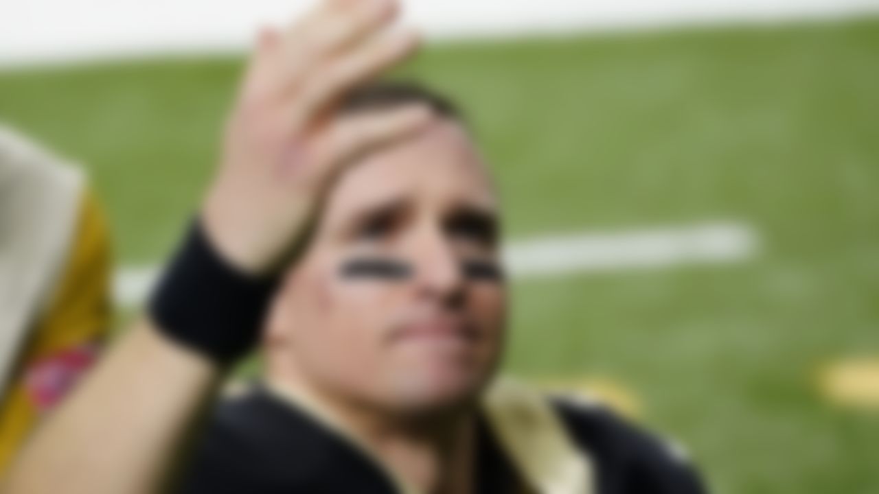 New Orleans Saints quarterback Drew Brees waves to his family and fans after an NFL divisional round playoff football game against the Tampa Bay Buccaneers, Sunday, Jan. 17, 2021, in New Orleans. The Buccaneers won 30-20 in Brees last game.
